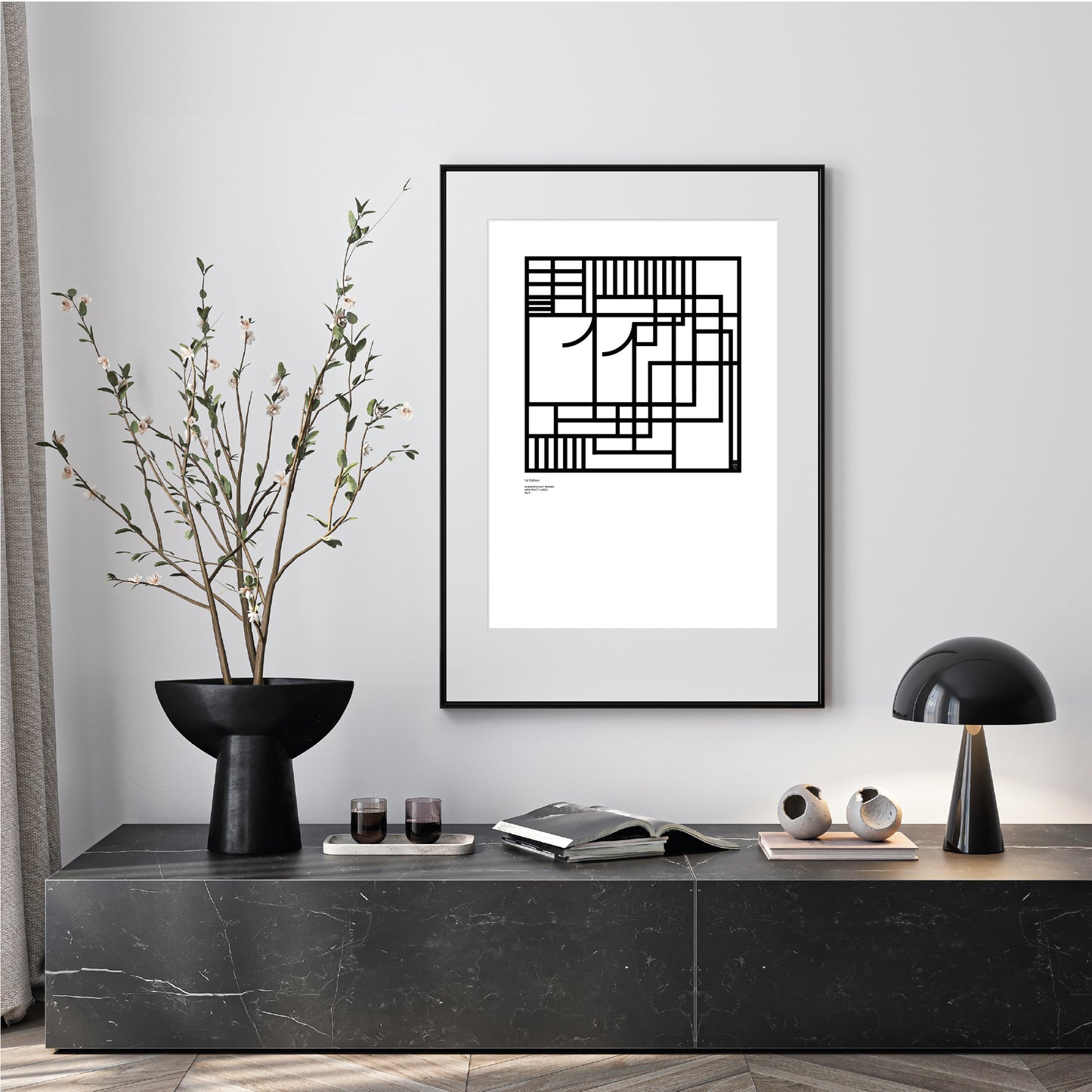 Modern interior with a black and white Numerology 11 abstract limited edition art print on a gray wall.