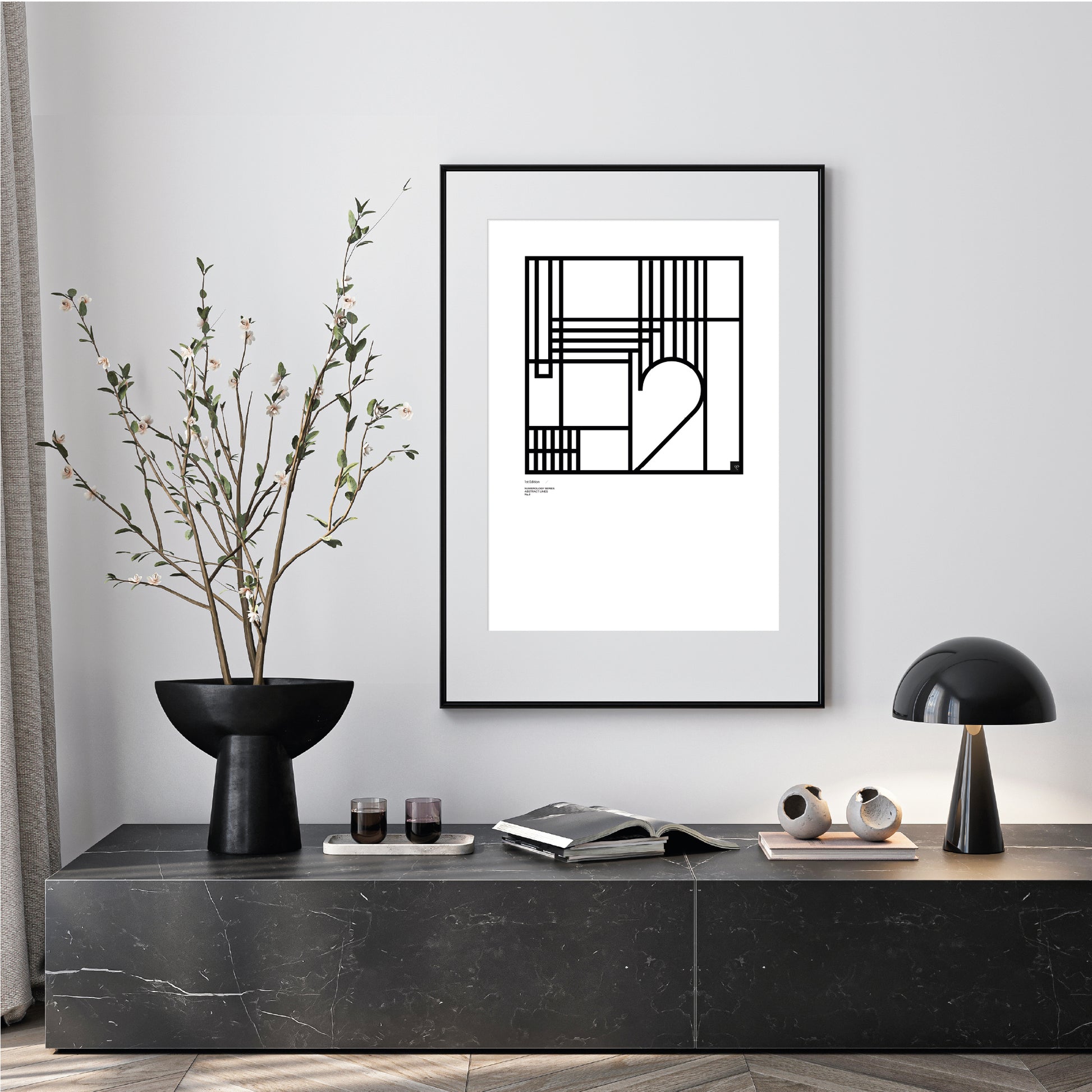 Modern interior with a black vase, Numerology Number 2 - abstract art, and decorative items on a shelf.