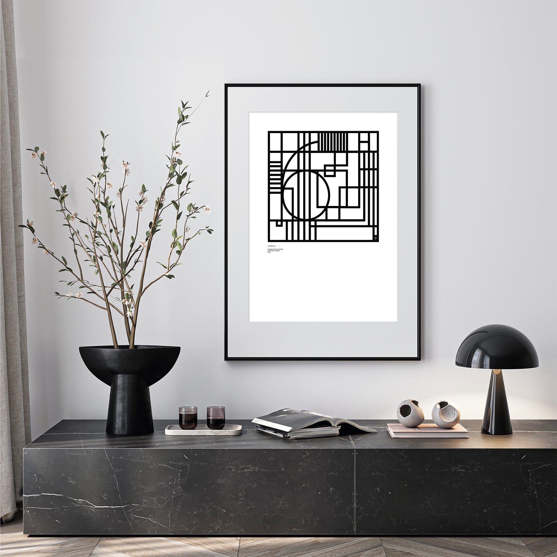 Modern interior with a black and white Numerology number 6, abstract limited edition print on a wall, accompanied by decorative items